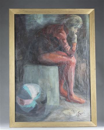 Child in red sitting next to a ball.
