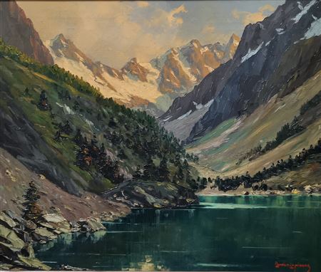 Effects of light on snowy mountains in front of a lake