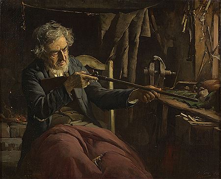 Man repairing a rifle