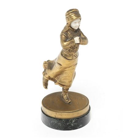 FIGURE OF A GIRL SKATING