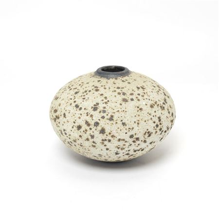 Low globular form with matte rust brown spotted cream glaze