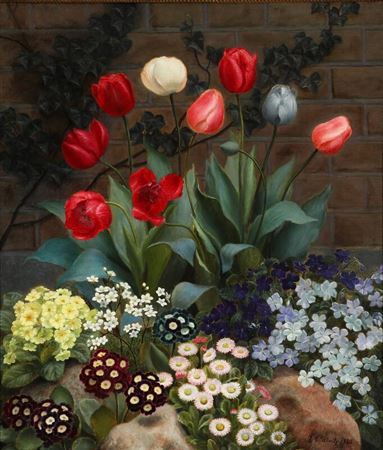 Flower bed in front of a wall