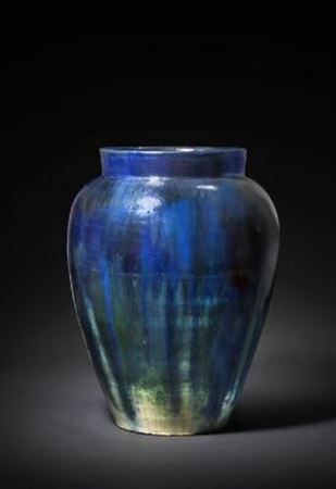An earthenware floor vase decorated in shades of blue, green and white by Thorvald Bindesboll - Auction record, sale price, and art valuation. Compare with similar artists and explore comparable artworks.