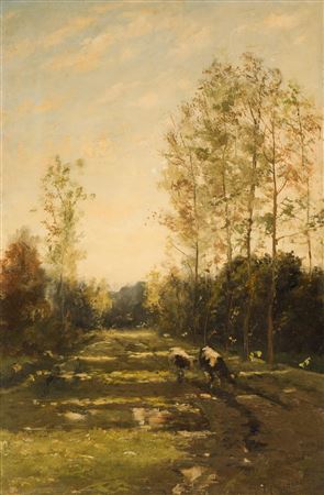 Wooded landscape with cows on a path
