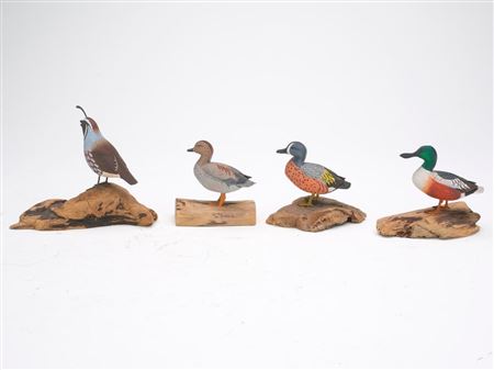 Four miniature carvings