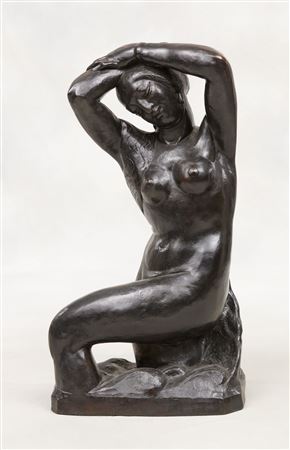Young nude woman with arms raised