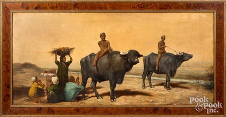 Arabian children riding water buffalo