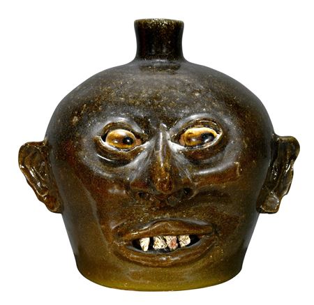 Rock Tooth Face Jug With Glazed Eyes