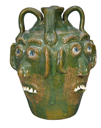 Face Jug With Four Faces