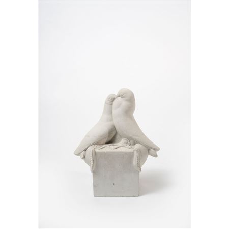 "Couple of embracing doves"