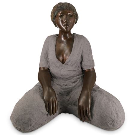 A seated woman.