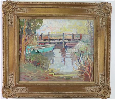 Rowboat at the edge of a stream