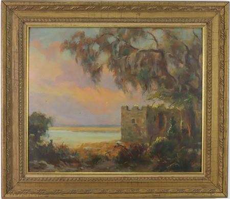 Overgrown landscape with a crumbling tower.