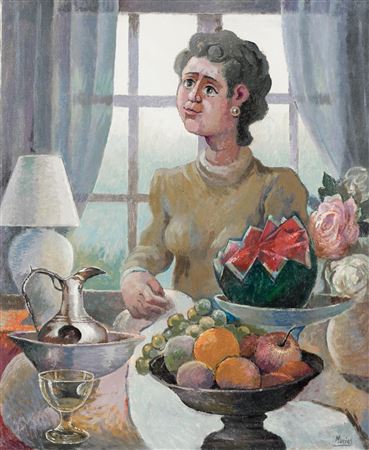 Woman reading with the light of a lamp
