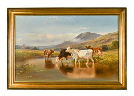 Cattle watering in a mountainous landscape with a church beyond