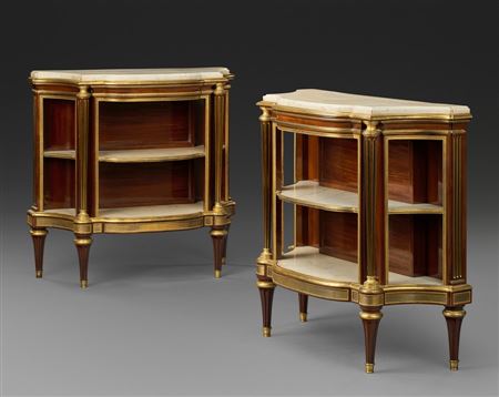 A PAIR OF LOUIS XVI ORMOLU-MOUNTED MAHOGANY CONSOLES