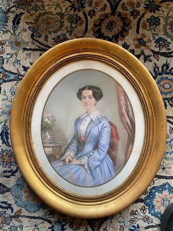Portrait of a Young Woman in a Blue Dress