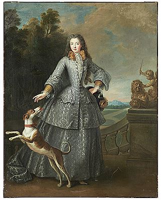 Portrait of a woman with her dog, full length
