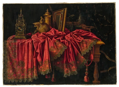 A clock, vases, a mirror and books on a gold and red embroidered cloth draped on a table