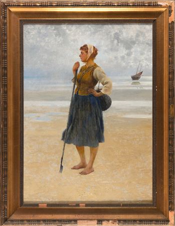 A woman standing on the beach.