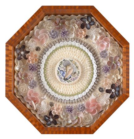 "Down by the Sea Side" sailor's valentine composed of multicolored shells.