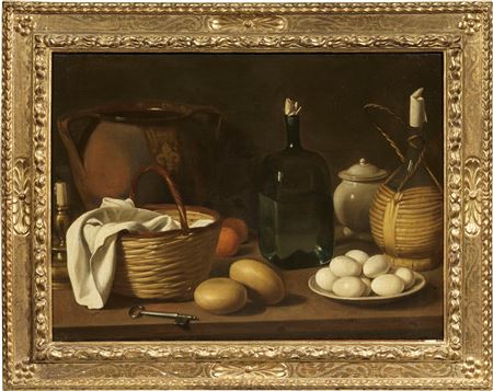 Still life with wicker basket, key, cheese and plate with eggs