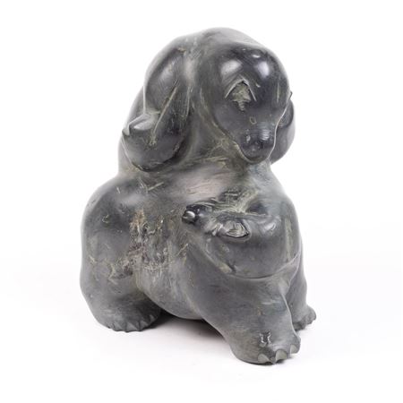 A LARGED INUIT SOAPSTONE GROUP OF TWO WRESTLING BEARS