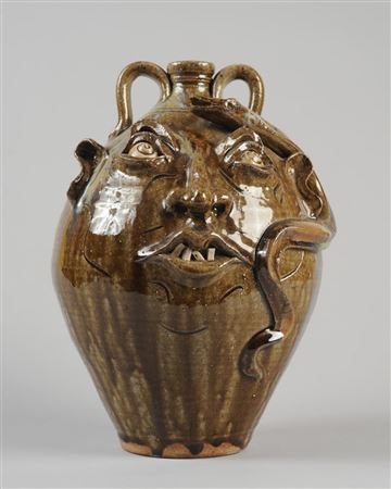Face Jug with snake