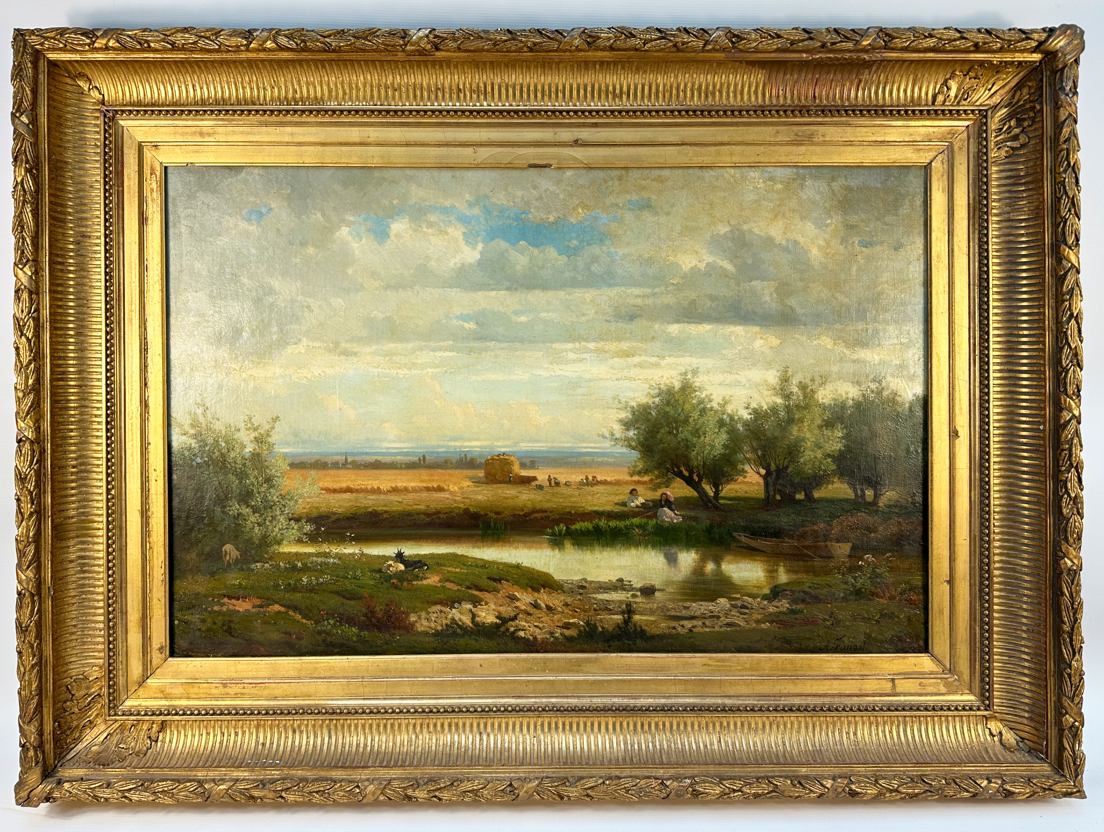 Couple by a pond
