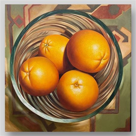 Still life of oranges in a crystal bowl