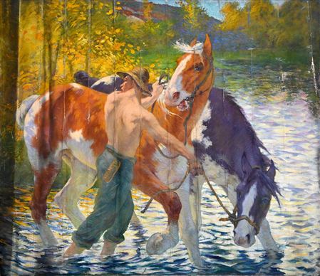 Young man taking two horses across a river