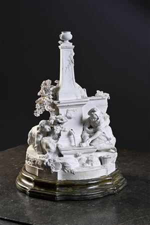 Peasant woman washing her foot at a fountain