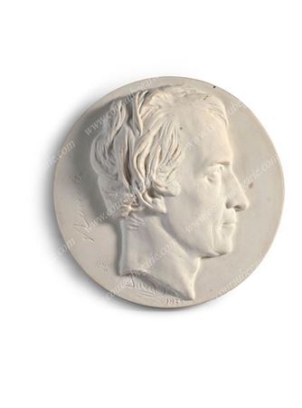 Profile of a man, head turned to the right.