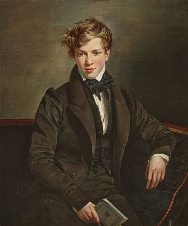 Portrait of a young man, wearing a black jacket and cravat, seated on a patterned sofa and holding a book
