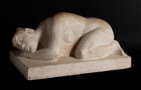 Female nude curled up