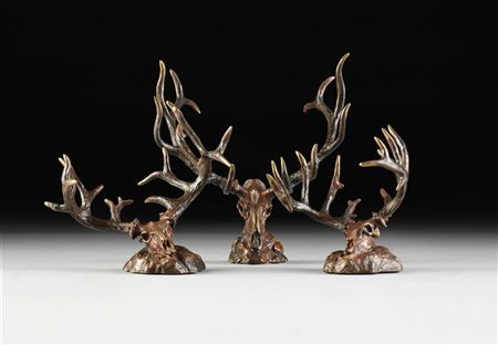 THREE WILDLIFE SCULPTURES, "Deer Skulls" (3)