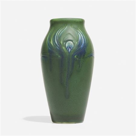Carved Mat vase with peacock feathers