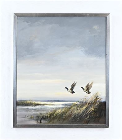 Puddle view with ducks flying up.