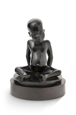 Seated Young African