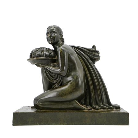 Woman Kneeling and Holding a Bowl of Fruit