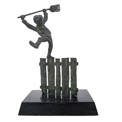 Bronze Boy on Fence Sculpture