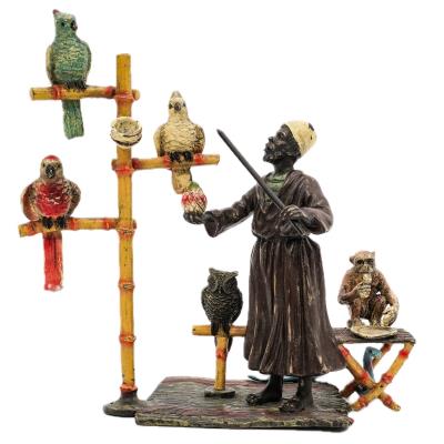Cold Painted Bronze Parrot Trainer Figure