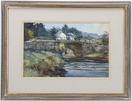 Landscape of a rural canal scene, with a weathered stone bridge