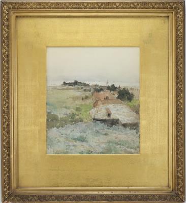 Coastal landscape with cottages and a hazy shoreline in the distance