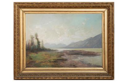 Lake landscape bordered by Alpine mountains