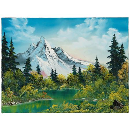 Lake Below Snow-Capped Peaks and Cloudy Sky