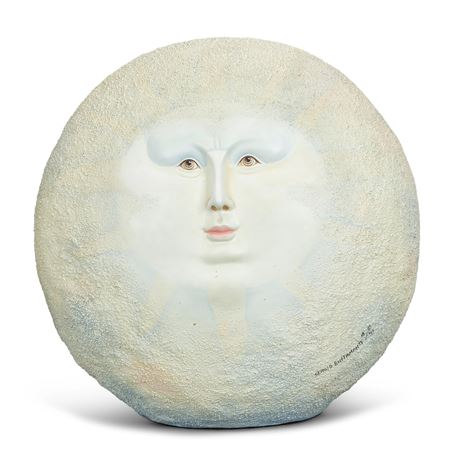 FIGURE OF A MOON FACE