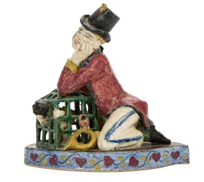 Stoneware figure group with polychrome glaze