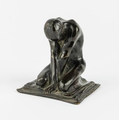 Kneeling man