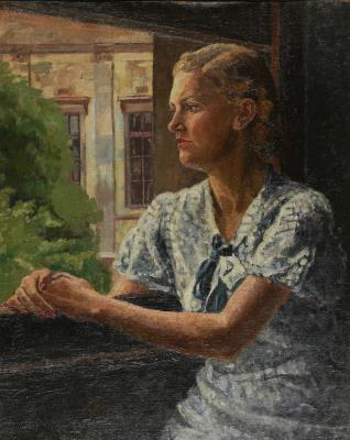 Portrait of a lady looking out of a window